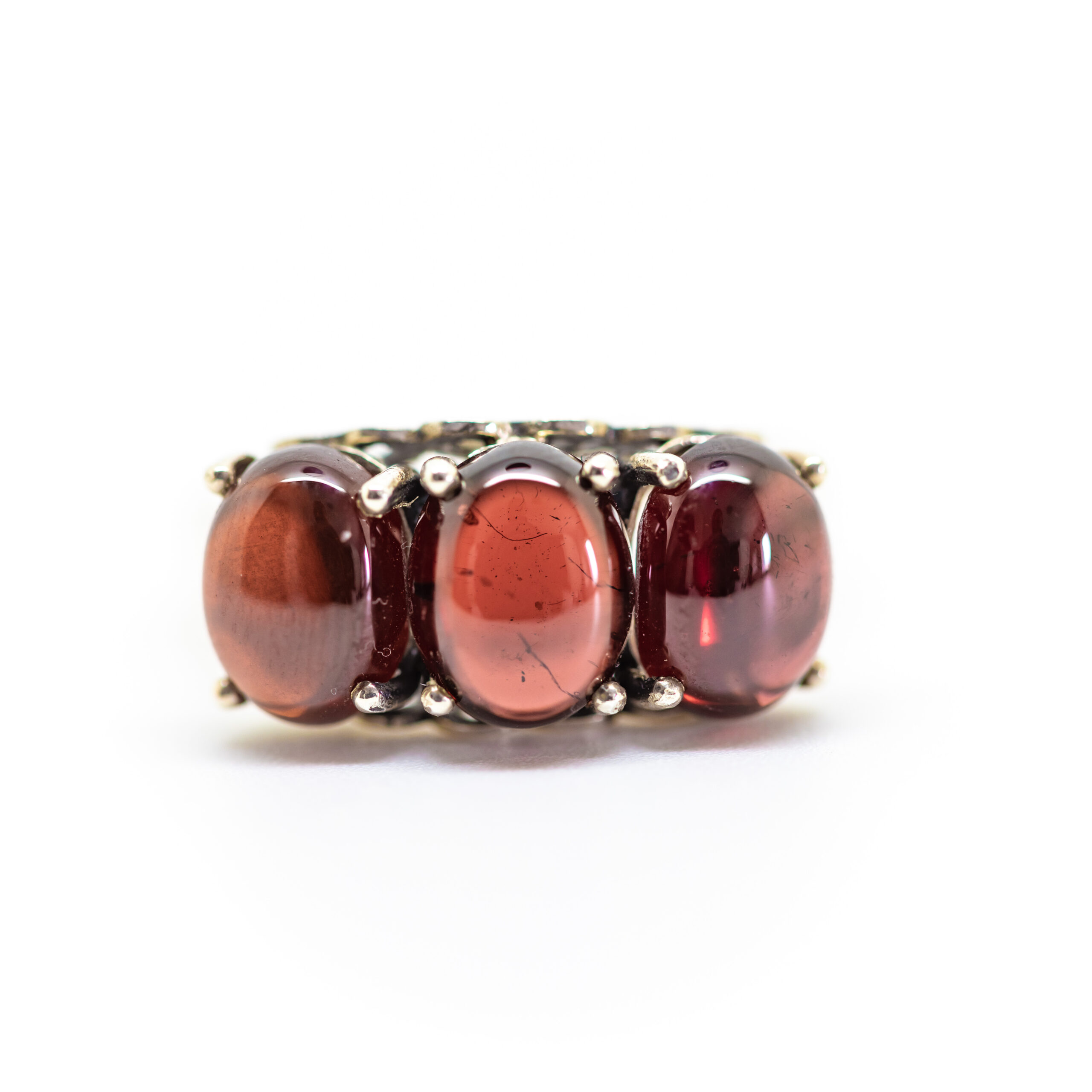 Garnet Cabochon Three-Stone Ring with Heart Detail