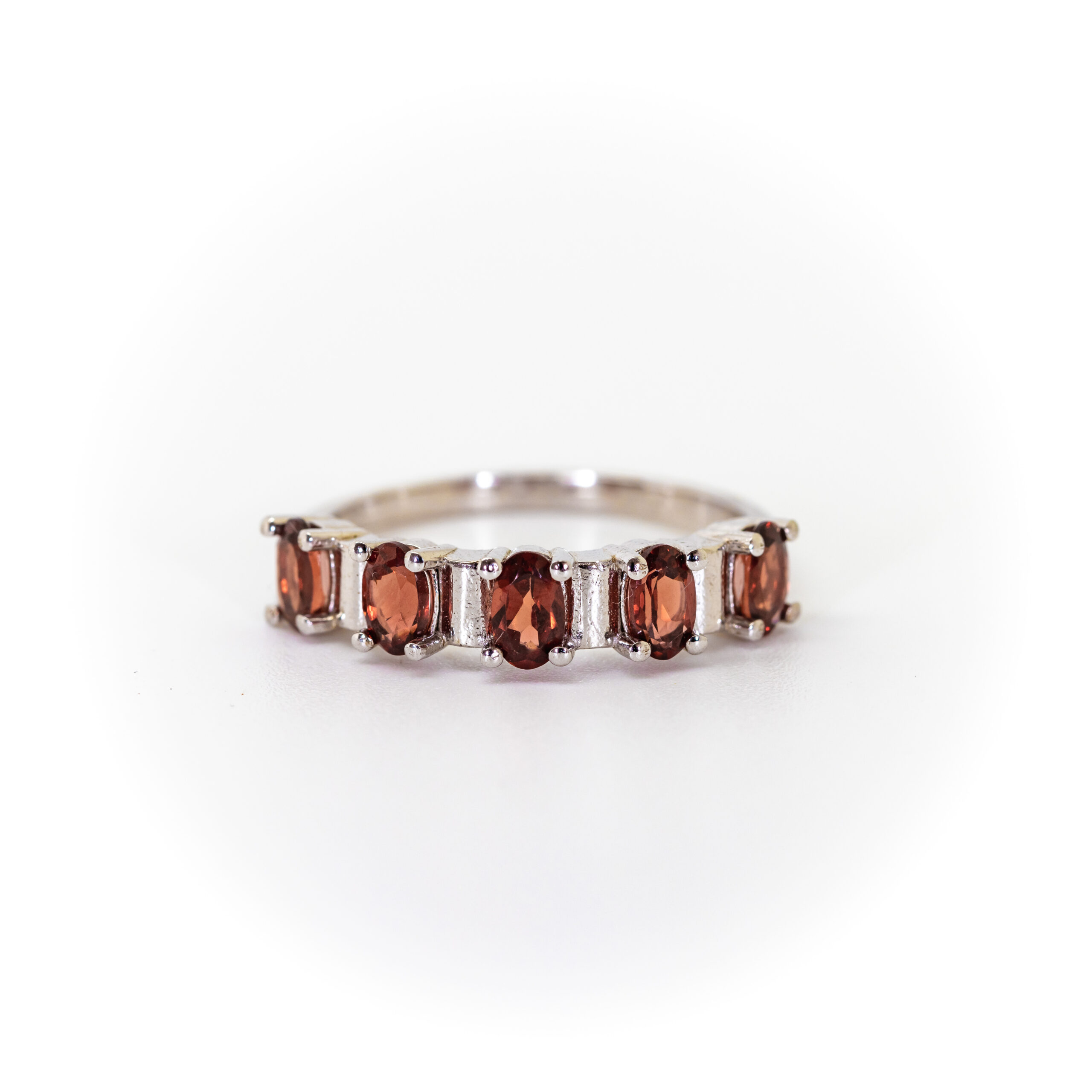 Oval Garnets Interspaced by Silver