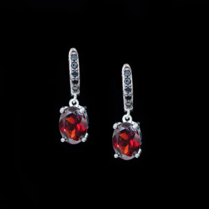 Black Spinel Pavé Huggie Hoops with Oval Garnet Drop