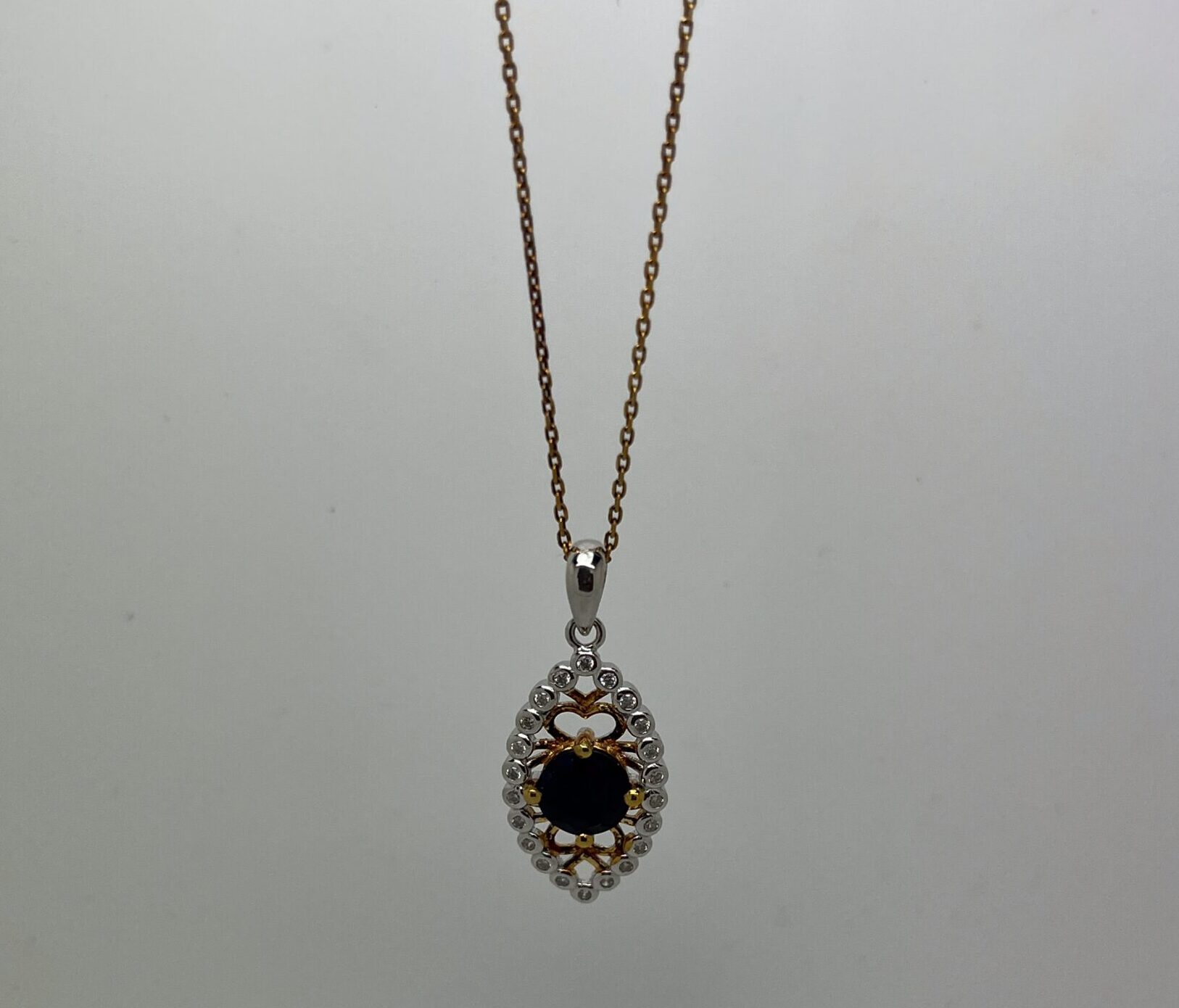 Mixed Metal "Evil Eye" Pendant with Sapphire Centre