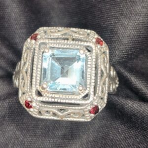 Princess Cut Blue Topaz Ring with Milgrain, Filigree Detail and Garnet Accents