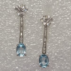 Oval Blue Topaz Drop Earrings with CZ Accent