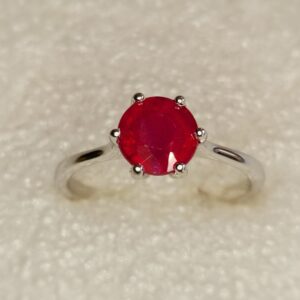Ruby six claw solitaire ring